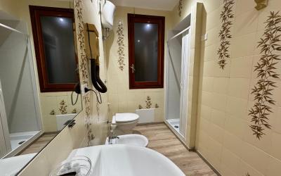 Camera Familiare con Vista Giardino