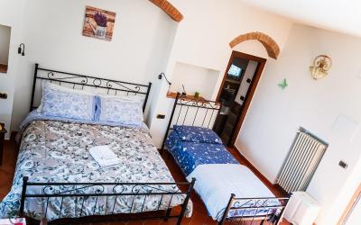 Camera Quadrupla Superior