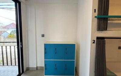 Tempat tidur di Kamar Asrama Campuran 6 Tempat Tidur.