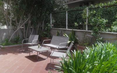 Camera Tripla con Vista Giardino