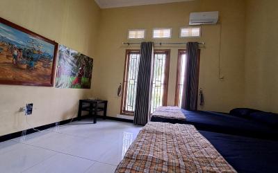 Kamar Keluarga dengan Kamar Mandi Pribadi Kamar Keluarga dengan Kamar Mandi Pribadi