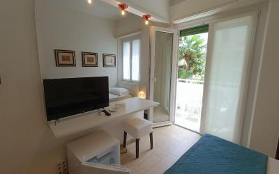 Camera Tripla Superior