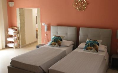 Camera Quadrupla Superior