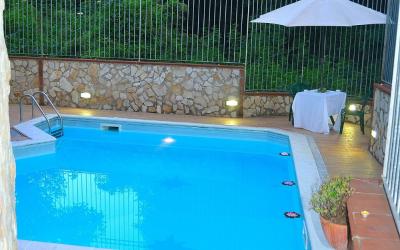 Camera Quadrupla con Vista Giardino 