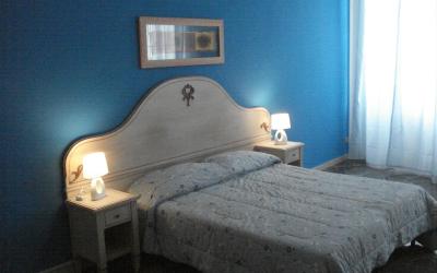 Camera Familiare con Bagno in Comune