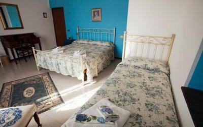 Camera Tripla con Vista Giardino