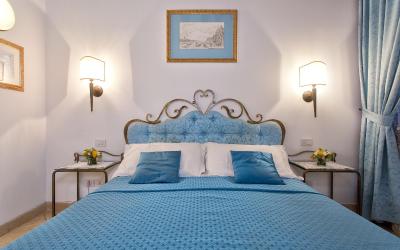 Camera Matrimoniale Superior con Letto Supplementare