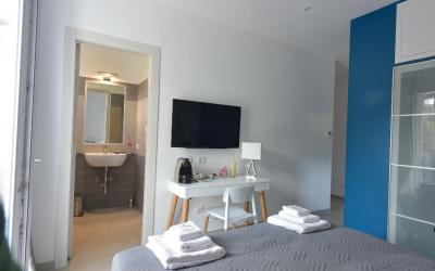 Camera Quadrupla con Terrazza e Giardino 