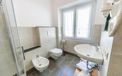 Camera Quadrupla Superior