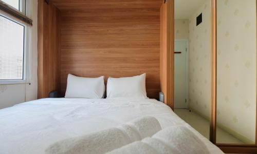 2BR Apartment Green Pramuka City near Shopping Mall By Travelio