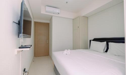 New Furnished 1BR Apartment at Gold Coast near PIK By Travelio