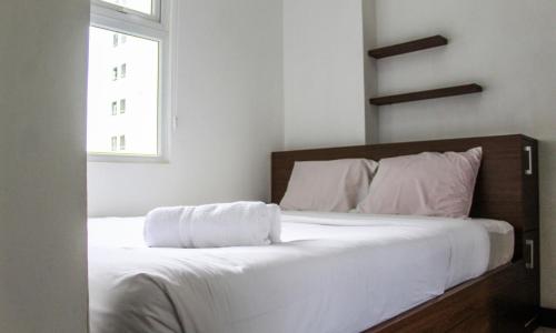 Comfortable and Tranquil 2BR Apartment at Green Pramuka By Travelio
