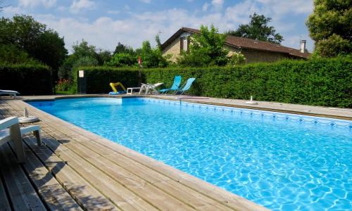 Appartement de 2 chambres avec piscine partagee jardin amenage et wifi a Blaignac