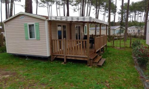 Bungalow de 2 chambres avec piscine partagee jardin amenage et wifi a Saint Julien en Born a 5 km de la plage
