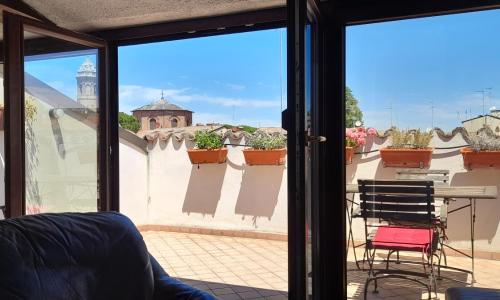 Corte Cavour. Una mansarda nel cuore della città