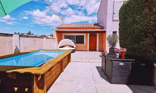 STUDIO PRIVATIF CLIMATISÉ , TERRASSE ET PiSCINE