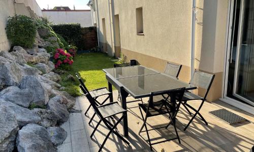 Appartement Spacieux proche digue avec jardin