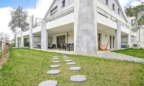 T4 NEUF - JARDIN-TERRASSE ET PISCINE – ACCÈS DIRECT PLAGES ET CENTRE VILLAGE – App C 12