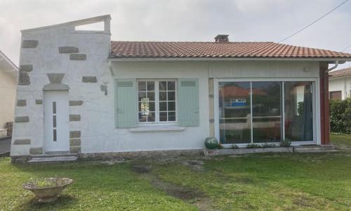 Charmante maison proche bassin