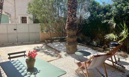 Gîte Le Palmier - Perfectly located cosy studio with private garden