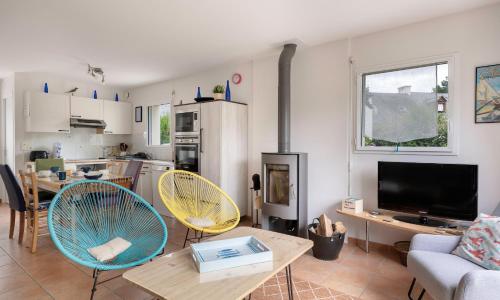 Maison familiale avec un grand jardin a Arzon