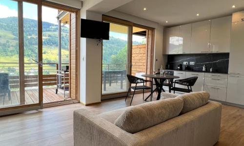 Magnifique appartement classé 4 étoiles avec Sauna et terrasse dans chalet