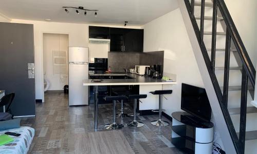 Appartement tout confort en mezzanine à 20mn à pied du centre-ville avec TV et Wifi