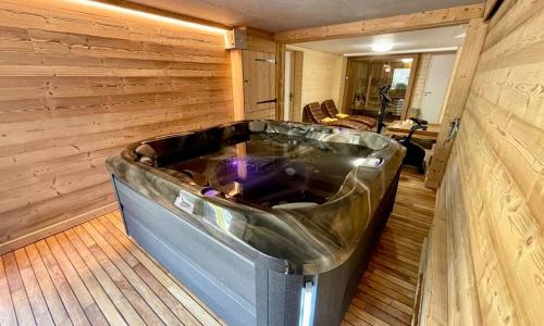 Chalet Kelly, centre ville / Jacuzzi / Sauna