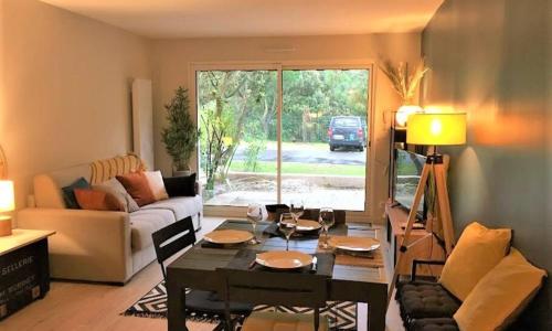 Bel appart neuf, terrasse , parking, plage à 400 m