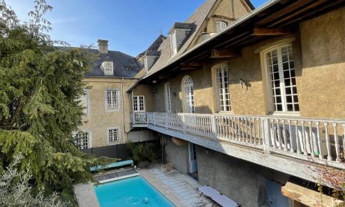 La Maison aux murs anciens et ses chambres