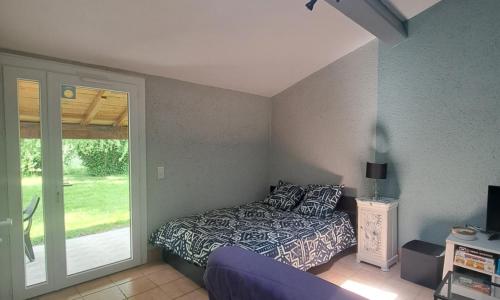 Studio avec jardin à 5 min du Parc Walibi