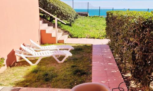 Cosy T2 refait à neuf climatisé, vue mer avec terrasse et jardin, Wifi piscine tennis et parking
