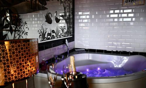 Appartement romantique avec jacuzzi et terrasse
