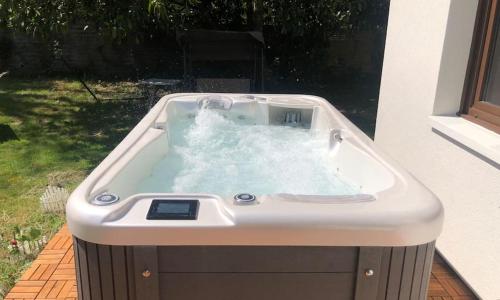 Maison de détente avec spa, hamacs, Ping pong