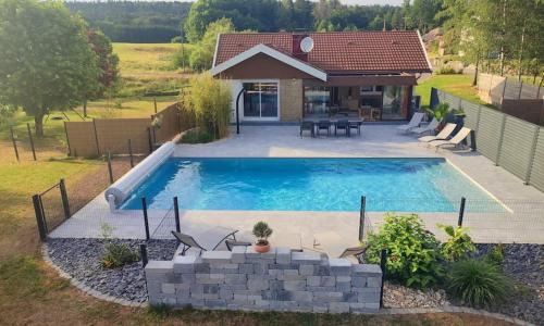 Maison avec piscine, jacuzzi et sauna