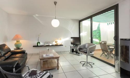 Grande maison avec patio au cœur du village