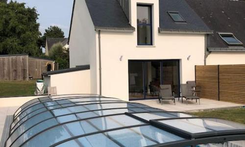 Maison bord de mer avec piscine couverte