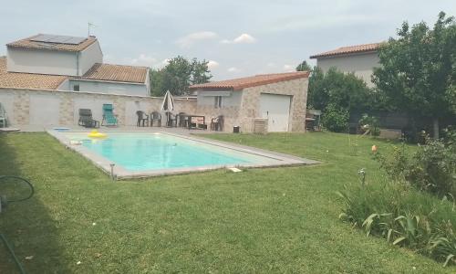 Appartement T1 28 m2 avec jardin et accès piscine