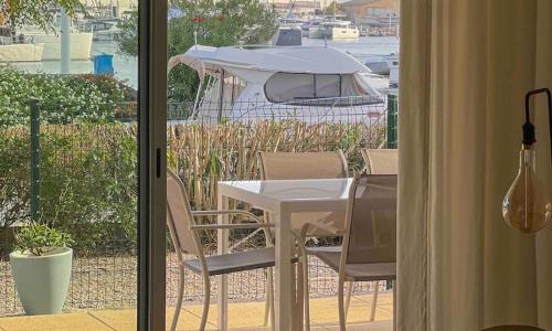 Face au bateaux, Neuf, 2 chambres , jardin