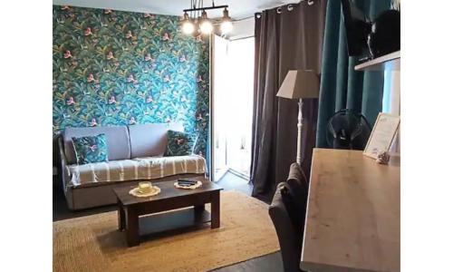 Kokua Développement présente Studio Cosy Résidence les Palmiers avec piscine