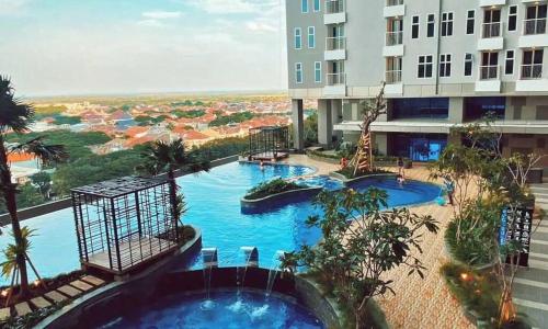Cozy Apartment on Top of Pakuwon City Mall