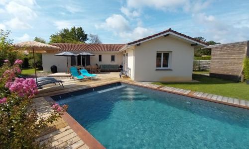 Mimizan Jolie maison moderne avec piscine chauffée 4 Ch et jardin