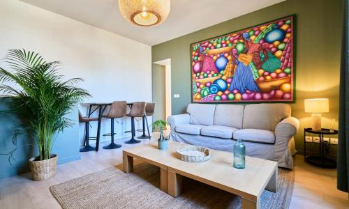 Duplex cosy et lumineux au pied du tram