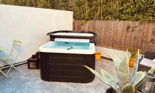 Appartement élégant avec jacuzzi privé