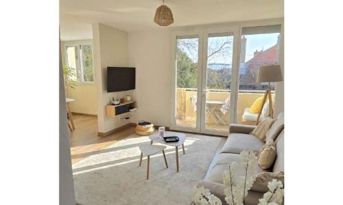 Superbe T3 cosy, parking gratuit + balcon