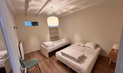 Appartement RDC 9 personnes, 2 chambres, wifi, proche du centre