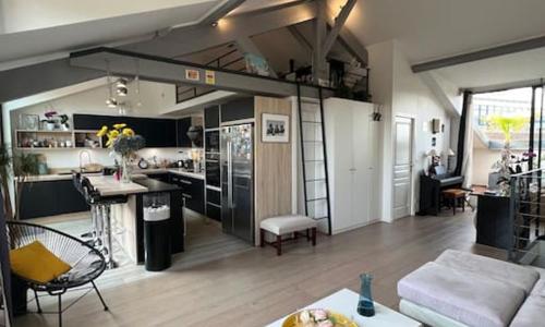 Superbe loft climatisé avec terrasse à 4 km JO