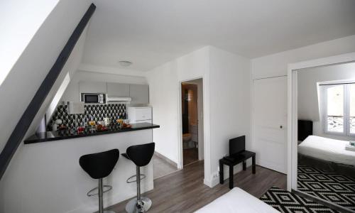 Studio tout équipé proche arc de triomphe - 2P