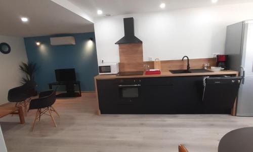 Appartement 50m2 rez de chaussée en plein centre ville garage gratuit