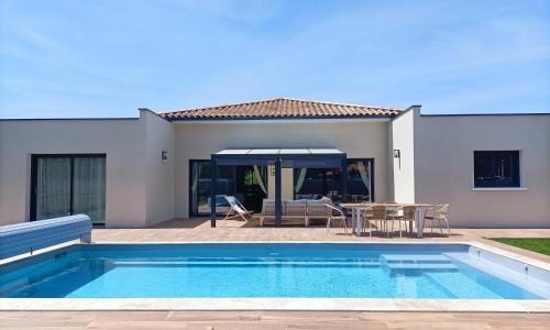 Maison neuve 200m2 climatisée, proche de la plage et des commerces